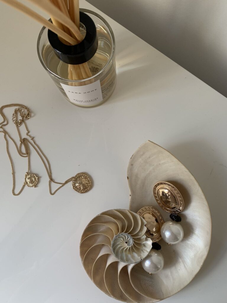 Jewelry on Table and in Shell